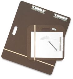 two brown clipboards with notepads on them