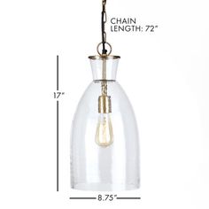 a glass light hanging from a chain with measurements