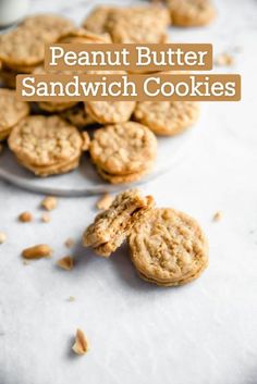 a plate full of cookies with one broken cookie in the middle and another half eaten