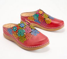 Flower power is back, and we can't get enough of it on these fab floral clogs. Boost your spring and summer wardrobe with this shoe that puts an extra spring in your step. From Spring Step. Spring Mules With Wooden Heel, Multicolor Slip-on Clogs For Spring, Spring Multicolor Closed Toe Mules, Multicolor Slip-on Mules For Spring, Multicolor Closed Toe Mules For Spring, Multicolor Leather Clogs For Spring, Spring Multicolor Leather Mules, Spring Clogs With Wooden Flat Heel, Spring Flat Heel Clogs With Removable Insole