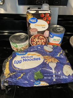 ingredients for an egg noodle dish sitting on the stove