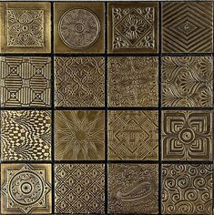 several different types of decorative tiles in gold