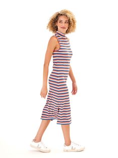 Feel confident and elegant in our Umi Feather Rib Midi Dress. This stretchy, soft ribbed dress features a high neck and flattering fit for a classy and comfortable look. Perfect for any occasion, it will make you feel confident and beautiful all day long! Ribbed Stretch High Neck Midi Dress, Casual High Neck Ribbed Midi Dress, Casual High-neck Ribbed Midi Dress, Stretch Ribbed High Neck Midi Dress, Casual Ribbed High Neck Midi Dress, Casual Ribbed High-neck Midi Dress, Spring Ribbed Turtleneck Dress, High Neck Ribbed Bodycon Midi Dress, Ribbed High Neck Bodycon Midi Dress