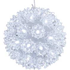 a white ball ornament hanging from a string with lights on the top and bottom