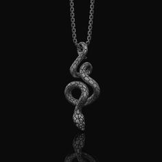 Silver Snake Charm - Serpent Pendant for Necklace or Bracelet, Symbolic Reptile Jewelry, Gift Idea Embrace the mystique of our Serpent Jewelry collection, featuring the intricate Silver Serpent and Serpent Pendant, each crafted to symbolize wisdom and renewal. Dive into the essence of Reptile Jewelry with our finely detailed Snake Jewelry and Silver Charm selections, perfect for those who cherish nature's cunning artisan. The Charm Pendant and Silver Pendant blend seamlessly into any ensemble, enhancing your style with a touch of elegance and mysticism. Our Snake Amulet and Symbolic Snake pieces are curated to offer profound spiritual connections, ideal for collectors of Animal Jewelry and those attuned to the natural world. Each Serpent Charm and piece of Mystic Jewelry not only accessori Reptile Jewelry, Snake Jewellery, Mystic Jewelry, Spiritual Connections, Serpent Jewelry, Mystical Jewelry, Animal Pendant, Snake Pendant, Snake Jewelry