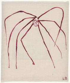 a drawing of a large spider on a white paper with red writing in the center