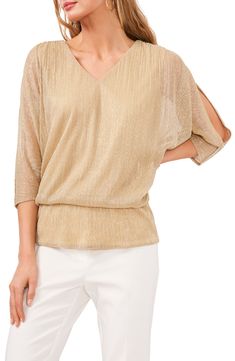 Flowy dolman sleeves accented with rows of rhinestones add to the glam look of a lightweight top shot through with metallic shimmer. V-neck Cold-shoulder three-quarter sleeves 55% Lurex® metallic fibers, 45% polyester Hand wash, line dry Imported Split Sleeve Top, Blouson Top, Split Sleeve, Glam Looks, Lightweight Tops, Cold Shoulder Top, Baby Clothes Shops, Trendy Plus Size, Dolman Sleeve