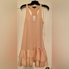 Pale Pink/Peach Hue Tank Top Pleated Skirt Dress. Nwt. Chic Peach Midi Dress With Ruffles, Chic Peach Ruffled Midi Dress, Elegant Peach Daywear Dress, Elegant Peach Dress For Daywear, Chic Peach Knee-length Dress, Chic Flowy Peach Dress, Peach Ruffled Dress For Daywear, Chic Peach Midi Dress For Day Out, Peach Sleeveless Midi Dress For Day Out