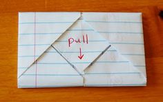 an origami piece with the word pull written on it and a marker next to it