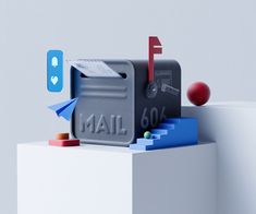 a mailbox sitting on top of a white pedestal next to an apple and paper airplane