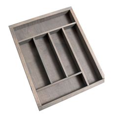 an empty wooden tray with compartments on it