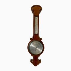 an old wooden grandfather clock with roman numerals on the face and dial, isolated against a white background