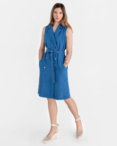 "Our trench linen dress LISBON in Cobalt blue marries professional flair with sustainable style. Sleeveless and inspired by the iconic trench coat, it boasts a double-breasted button closure and a sleek tie belt for a defined silhouette. Versatile enough to be worn as a dress or a long vest over a white shirt and jeans, it features eco-friendly Bioresin buttons and side pockets, ensuring a polished, environmentally-conscious look. Details: * Straight cut * Midi-length * Side pockets  * Sleeveles Elegant Blue Linen Workwear Dress, Elegant Blue Linen Dress For Work, Blue Sleeveless Knee-length Dress With Pockets, Blue Knee-length Sleeveless Dress With Pockets, Sleeveless Linen Work Dresses, Sleeveless Linen Dresses For Work, Blue Sleeveless Dress With Pockets, Sleeveless Linen Dress With Pockets For Work, Sleeveless Trench