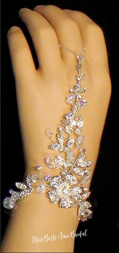 Hand-twisted rhinestone flowers and leaves, accented with floating crystals and rhinestones. The Silver is available in all crystals or with crystals and pearls. The gold is just crystals. Silver Hand Accessories, Prom Assessories Ideas, Luxury Silver Jewelry For Fantasy Events, Formal Accessories Jewelry, Luxury Fantasy Wedding Jewelry, Fairytale Wedding Jewelry, Something Blue Wedding Jewelry, Prom Assessories, Silver Prom Accessories