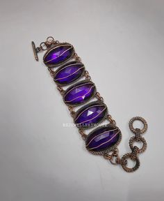 Hello and Welcome To RSJEWELLERYHOUSE , where we present our best designed products. We, self are the designers, makers and sellers. We have aimed to Supply Good Quality Products at best prices around. Faceted Amethyst Bracelet Copper Wire Wrapped Bracelet Gemstone Bracelet Handmade Copper Jewelry Statement Jewelry For Gift For Husband Handmade Copper Bracelet   Metal -Copper Gemstone- Faceted Amethyst Color- Purple  Benefits Of Wearing Amethyst Jewelry- This stone helps those who are stressed out all the time and want to let go of their past traumas. It also lessens sadness and anxiety. Although it is thought that wearing. Amethyst Jewelry has soothing effects on the wearer, natural  amethyst actually strengthens your physical, mental, and spiritual health. Benefits Of Wearing Copper Jewe Handmade Metal Crystal Bracelet As A Gift, Handmade Adjustable Metal Crystal Bracelet, Handmade Purple Metal Beaded Bracelets, Handmade Purple Metal Bracelets, Purple Metal Bracelets As Gift, Purple Metal Bracelets As A Gift, Adjustable Purple Metal Crystal Bracelet, Purple Metal Beaded Bracelet As Gift, Purple Metal Beaded Bracelets As Gift