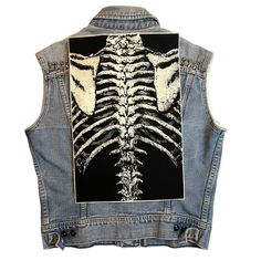 "Ribcage Cotton Canvas BACK Patch Artwork by Comic book writer/artist, Nat Jones Printed on off-white Classic Cotton Canvas 100% Cotton Weight: 275g/m2 Raw Cut (you can cut to desired size/shape) Comes in two sizes: REG: Measures about: 16.25 inches Tall, 10.75\" Wide XL: Measures about: 19 inches Tall, 12.5\" Wide Smooth, even surface texture. Moderate structure. Very durable fabric that can be used for high use projects in natural fibers. Care Reactive inks are permanent. Due to some residual ink from the print process, for first washing wash alone with a full load setting in cold water. Add a mild detergent, 1 cup vinegar and 2 tsp salt. For future washes, machine wash cold water with a phosphate free detergent. Machine dry on high heat. Iron on cotton setting or medium to high heat. Ex Ribcage Skeleton, Lovers Skeleton, Skeleton Lovers, Comic Book Writer, Punk Patches, Cat Patch, Battle Jacket, Clothing Patches, Grunge Goth