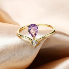 Holiday Notice: We will be on holiday from Feb 6 to Feb 15 for the Spring Festival. Orders will be shipped after we resume work.  Dainty Amethyst Promise Ring, Pear Shape Amethyst Ring Silver, Purple Gemstone Ring, February Birthstone, Alternative Engagement Ring, GiftsFeatures• Made to Order. • Material: 925 Silver with Gold Plated• Gold Color: Yellow Gold• Stone Type: Natural Amethyst and White Topaz• Ring Size: US4.5 - 8.5• Ready to Ship in 7-10 Business Days Want to find out more? Check out Purple Teardrop Amethyst Ring For Anniversary, Purple Teardrop Fine Jewelry Ring, Fine Jewelry Teardrop Purple Ring, Fine Jewelry Purple Teardrop Ring, Purple Teardrop Gemstone Rings, Purple Teardrop Amethyst Ring, Teardrop Amethyst Ring In Purple, Teardrop Amethyst Ring, Purple Amethyst Teardrop Ring