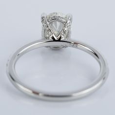 a white gold engagement ring with diamonds on it