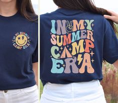 In My Summer Camp Era Shirt, Summer Camp Shirt for Kids, School Camp Shirt, Camping Crew,Camping Family Gift,Girls Camp Shirt,Camp Lovers T-Shirt,  Explore our exclusive line of specially designed t-shirts tailored for football enthusiasts and everyone who appreciates style, modernity, and comfort. Your search for trendy, adorable, and cozy tees ends right here. ❀ SPECIFICS ❀ We take pride in using only the best in the industry - Bella Canvas and Gildan Soft Style brand shirts for printing. *Bel Summer Camping Shirt With Letter Print, Summer Camping Shirt With Graphic Print, Summer Graphic Print Camp Shirt, Blue Cotton Tops For Camping, Summer Camp Shirt, Camping Family, School Camp, Girls Camp, Brand Shirts