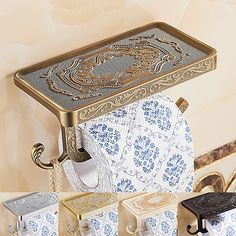 an ornately decorated toilet paper roll holder