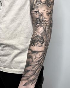 a man with a tattoo on his arm