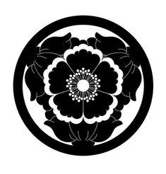 a black and white circular design with flowers inside the center on a white background illustration