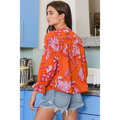 BucketList Orange and Red 100% Polyester Long Sleeve Crewneck 3/4 Sleeves Bell Sleeves Ruffled Details T2239-ORANGE Make a bold statement with the BucketList Women's Orange and Red Floral Crepe Blouse. Crafted from lightweight crepe fabric, this blouse offers both comfort and style for any occasion. The vibrant orange and red floral pattern adds a pop of color to your ensemble, instantly brightening your look. With its versatile design, this blouse can be dressed up with trousers for a polished Trendy 3/4 Sleeve Blouse For Brunch, Bold Red Tops For Spring, Trendy Orange Spring Blouse, Trendy Orange Blouse For Spring, Trendy Red Blouse For Brunch, Red Trendy Spring Blouse, Spring Brunch Red Blouse, Trendy Red Spring Blouse, Red 3/4 Sleeve Summer Blouse