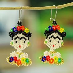 the beaded earrings are decorated with colorful beads