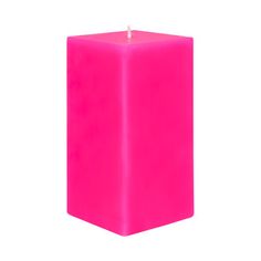 a bright pink candle is lit on a white background