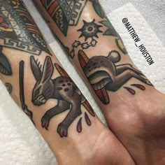 two people with matching tattoos on their arms