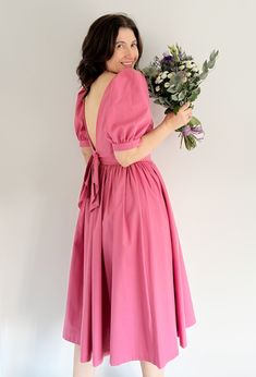 🌸 VINTAGE LAURA ASHLEY PINK LOW BOW BACK FIT AND FALRE COTTON MIDI OCCASION DRESS 🌸 Whether you're a bridesmaid, wedding guest or attending a special event, this dress exudes sophistication and charm. In a delightful pink, this dress features a charming low bow back detail.  This dress is ready to make a statement and turn the heads of all! **WELCOME TO SEASONALLY DRESSED** BRAND ~ LAURA ASHLEY  (RARE) 👗 Size: UK 12 today  Label is a UK 14 Model is a UK 12 | 5FT 6 |  (FITS PERFECTLY) Underarm Occasion Dresses Uk, Midi Dress Wedding, Pink Bow Dress, Midi Dress Wedding Guest, Vintage Bridesmaids, Vintage Laura Ashley, Laura Ashley Dress, Dress Wedding Guest, Bow Dress