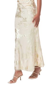 Glistening goldtone foil lends ethereal glamour to this head-turning skirt that gently flares out at the hem. Pull-on style Lined 100% polyester Hand wash, line dry Imported Spring Evening Flare Skirt, Elegant Flared Bottoms For Wedding, Flare Skirt For Spring Evening, Elegant Gold Wedding Bottoms, Elegant Gold Maxi Skirt For Evening, Elegant Lined Gold Skirt, Elegant Gold Maxi Skirt For Summer, Elegant Gold Maxi Skirt For Spring, Glamorous Long Gold Skirt