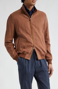 The midcentury-classic bomber jacket is refreshed in Loro Piana Solbiati heavy linen twill, a fabric that for all it's rugged looks has a comfortable softness. 28" length Two-way front-zip closure Mock neck Front zip pockets Ribbed cuffs and hem 100% linen Dry clean Made in Italy Designer Clothing Casual Linen Outerwear With Stand Collar, Modern Linen Outerwear For Fall, Fall Linen Outerwear With Stand Collar, Brown Relaxed Fit Linen Outerwear, Brown Linen Outerwear With Relaxed Fit, Brown Linen Casual Outerwear, Casual Brown Linen Outerwear, Rugged Look, Rollerball Perfume