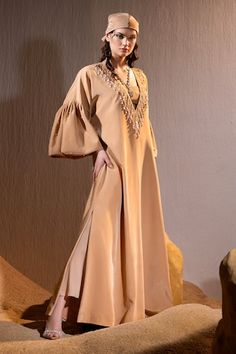 Caramel brown tulip sleeves floor length V neck kurta with dangling pearl, sequin, glass bead tassels embellishments on the neckline. Paired with a bustier. - Aza Fashions Elegant Brown Festive Kaftan, Festive Brown Elegant Kaftan, V Neck Kurta, Bead Tassels, Women Kurta, Tulip Sleeve, Caramel Brown, Beaded Tassels, Aza Fashion