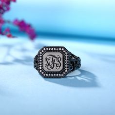 Surprise someone with the charming good looks of this Monogram Ring handcrafted in 925 sterling, featuring a dainty square-shaped design in the center nestled beside sparkling cubic zirconia detail. Personalize 3 initials on this stunning monogrammed ring. This classic Ring is beautiful and can adorn any finger on your hand. Font: Silver Monogram Diamond Rings, Silver Diamond Ring With Monogram, Diamond Monogram Initial Ring For Promise, Classic Silver Initial Ring With Diamond Accents, Anniversary Monogram Jewelry In Cubic Zirconia, Personalized Silver Initial Ring With Cubic Zirconia, Personalized Silver Cubic Zirconia Initial Ring, Personalized Silver Cubic Zirconia Diamond Ring, Silver Cubic Zirconia Initial Ring For Wedding