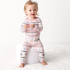 Made with super soft Lenzing Micromodal© these matching pant and top sets will keep your little one super cozy and snuggly. 95% Lenzing Micromodal© and 5% spandex Wash cold with like colors; stays soft wash after wash Fits snug; not treated with flame retardants Pink Reindeer Pajamas, Cute Loungewear Sets With Long Pants, Matching Winter Loungewear Sets, Matching Loungewear Sets For Winter, Playful Winter Playwear Sets, Playful Cotton Leggings For Loungewear, Matching Set Loungewear For Winter, Cute Cotton Leggings For Loungewear, Stretch Long Sleeve Playtime Set