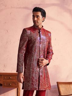 Vastramay Men's Maroon Georgette Sherwani Only Top Step into elegance with the Vastramay Men's Maroon Georgette Sherwani Top. Crafted with meticulous detail, this sherwani top combines traditional craftsmanship with contemporary style. Perfect for weddings and festive occasions, it exudes sophistication and charm. Features Exquisite maroon georgette fabric Elegant design with intricate detailing Perfect fit for special occasions Specifications Color: Maroon Material: Georgette Size Options: Avai Festive Straight Kurta Bandhgala For Reception, Formal Sherwani With Mirror Work, Formal Bandhgala With Mirror Work, Festive Long Sleeve Sherwani For Reception, Bandhgala Straight Kurta For Diwali Reception, Eid Party Bandhgala Straight Kurta, Diwali Reception Bandhgala Straight Kurta, Fitted Bandhgala For Festive Occasions Like Diwali, Fitted Anarkali Bandhgala With Mirror Work