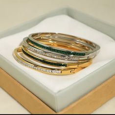 18k Gold Plating Hypoallergenic Tarnish-Free Gold White Stone Gold Emerald Stone Silver White Stone Silver Emerald Stone Silver Plated Bracelets, Silver Gold Plated Bracelets, Silver Gold-plated Bracelets, Stainless Steel Bracelets With Plating As Gift, Luxury Silver Plated Bracelets, Tarnish Resistant Gold Plated Silver Bracelet, Modern Silver Gold-plated Bangle, Stackable White Gold Bangle As A Gift, Elegant Gold Plated Silver Bangle