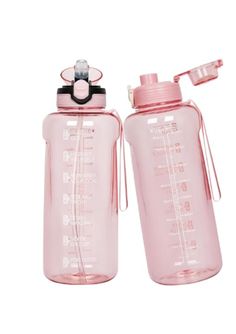 two pink water bottles sitting next to each other