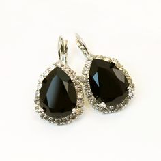 Black Earrings Crystal Clear Black teardrop Black Chandelier Earrings Black Drop Earrings Halo earrings premium rhinestones,Silver, SE101 A sparkly pair of leverback drop earrings made with genuine 13/18mm premium high quality crystals. Surrounded by small sparkling crystals. Total size of the earring: Length 30mm Width: 16mm Sparkly and Colorful, Hard to ignore. Check the additional photos to choose more colors. There are matching necklaces rings and bracelets to go with it in my shop. All item Black Teardrop Crystal Jewelry, Evening Teardrop Chandelier Earrings With Sparkling Stones, Black Teardrop Rhinestone Jewelry, Black Teardrop Jewelry With Rhinestones, Black Drop Teardrop Earrings For Party, Black Teardrop Drop Earrings For Party, Black Teardrop Earrings For Party, Sparkling Drop Teardrop Earrings For Evening, Evening Teardrop Earrings With Sparkling Stones