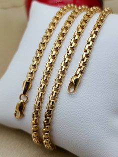 14k real gold hand crafted Square Box Chains in different sizes, all with Lobster Claw closures. 2mm/3mm/4mm thickness. Best birthday/anniversary gift. Handmade in our shop. *19.50 inches, 2mm thickness, 6.17gr* *21.50 inches, 3mm thickness, 6.88gr* *22 inches, 3mm thickness, 13.13gr* *23.50 inches, 4mm thickness, 14.62gr* *24 inches, 4mm thickness, 15gr* *26 inches, 4mm thickness, 15.27gr* *28 inches, 4mm thickness, 16.86gr* *585 Certified, stamped* Highest quality of gold ONLY REAL GOLD Explore delicately designed pieces of Box gold necklaces. Exceptionally handcrafted and hand picked in different sizes and variations to match yours and your loved ones desires. Priced to sell! Compare our prices to other similar sellers! Arrives in a GIFT BOX and includes FREE SHIPPING within the USA and Mens Chain Designs, Gold Neck Chain, Gold Earrings For Kids, Real Gold Chains, Diamond Bracelet Design, Mens Silver Jewelry, European Jewelry, Gold Chain Design, Fine Gold Jewelry