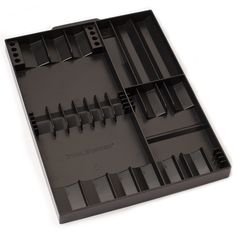 an open black plastic case with several different tools in it