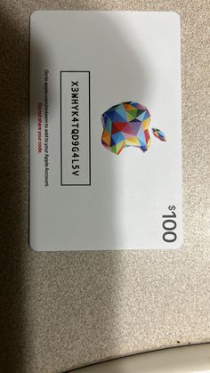 an apple credit card sitting on top of a counter