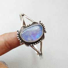 925 Sterling Silver Handmade Cuff Bracelet Gemstone - Blue Flashy Rainbow Moonstone Stone Shape - Fancy Colour - White Colour with Blue/Rainbow Fire Cut - Plain Cabochon Gemstone Size - 27*17 mm QTY - 1 piece. # Please send us your message in conversation if you have any questions or need more quantity of any particular item . Moonstone Cuff Bracelet, Handmade Elegant Moonstone Cuff Bracelet, Silver Moonstone Bangle, Bohemian Silver Moonstone Cuff Bracelet, Artisan Silver Multi-stone Cuff Bracelet, Cuff Bracelets Handmade, Sterling Silver Cuff Bracelet, Christmas Gift Jewelry, Hand Jewelry