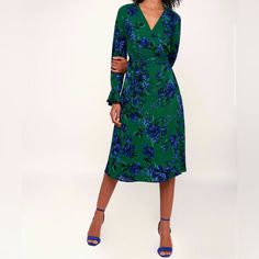 New With Tags! A Budding Romance Is Sure To Blossom When You Walk In The Room Wearing The Lulus Romantic Blooms Green Floral Print Midi Wrap Dress! An Elegant Floral Print, In Shades Of Blue And Green, Adds Femme Detail To This Sleek Woven Wrap Dress, With A Plunging Neckline And Long Sleeves With Elasticized Flounce Cuffs. Self-Tie Sash Cinches The Waist Above A Modest Midi Skirt. Pair With Lace-Up Heels For A Fun And Flirty Look! Fit Bust: Great For Any Cup Size. Waist: Loosely Fitted. Hip: No Green Floral Knee-length Dress For Brunch, Green Floral Print Midi Dress For Work, Green Floral Print Dress For Work, Green Floral Print Work Dresses, Elegant Green Floral V-neck Dress, Woven Wrap, Midi Wrap Dress, Green Floral Print, Elegant Floral