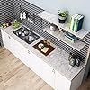 an aerial view of a kitchen with stoves and counter tops