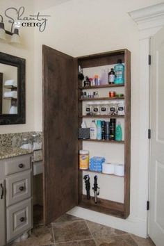 an open medicine cabinet in the corner of a bathroom