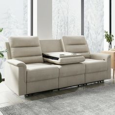 a living room scene with focus on the reclining sofa