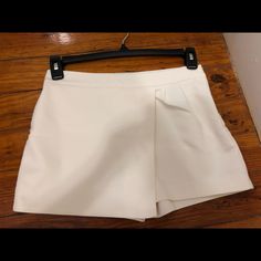 Cream Wrap Style Zara Shorts In Size Xs Great Condition, Never Worn White Bottoms With Built-in Shorts For Night Out, Chic Zara Short Leg Bottoms, Chic Zara Bottoms With Short Legs, Zara Short Length Skort, Chic Fitted Zara Shorts, Chic Zara Shorts For Day Out, White Shorts For Night Out, Elegant Stretch Shorts For Day Out, Elegant Short Skort By Zara