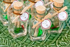 small glass bottles with wooden sticks sticking out of them